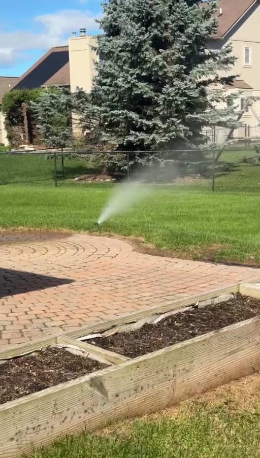 Active sprinkler zone during 2026 winterization work in Macomb Township Michigan